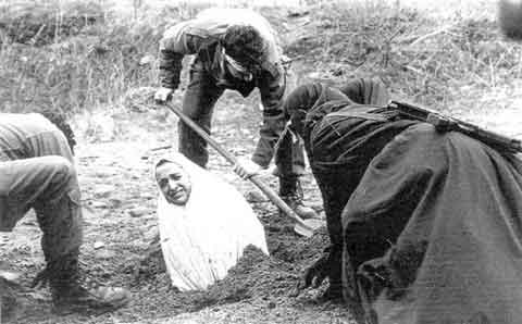 A woman about to be stoned by this 'peace'ful religion